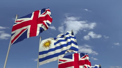 Realistic Waving Flags of Uruguay and United Kingdom