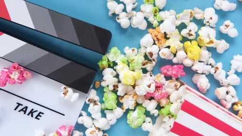 Colorful Popcorn with Film Slate Overhead