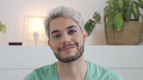 Smiling Young Adult with Eye Makeup, Close Up