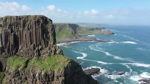 The Giants Causeway lies at the foot of the basalt cliffs along the sea coast on the north shores of