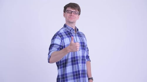 Smiling Man Gives Thumbs Up on White Background