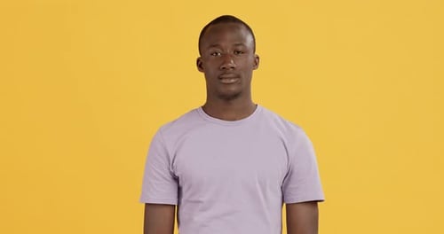 Man Has Eureka Moment on Yellow Background