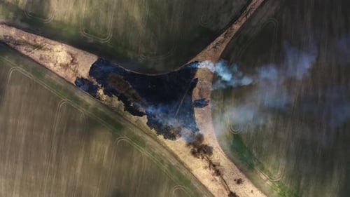 Epic aerial Footage of Smoking wild fire. Forest and field in the fire. Africa and USA wildfires.