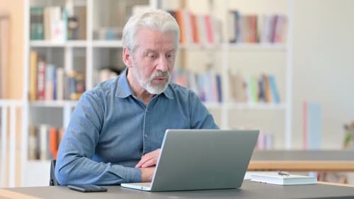 Senior Man Using Laptop for Video Chat