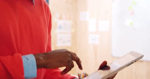 Man using digital tablet in office