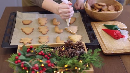 Decorating Christmas Gingerbread Cookies with Icing at Home