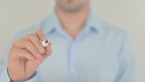 Writing the Word INQUIRY on Clear Surface