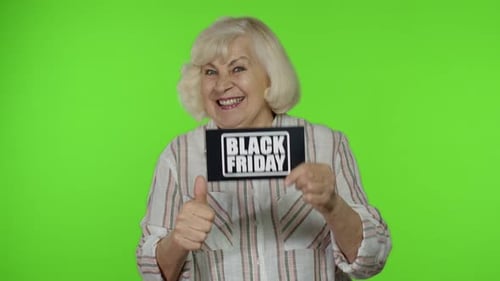 Senior Woman Promotes Black Friday Sales