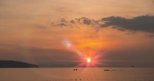 Time-lapse of Light Rays Over the Sea or Ocean at Sunset. Hot Summer Weather at Tropical. Panoramic
