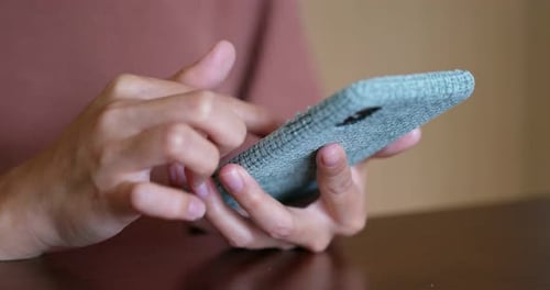 Hands Using Smartphone Device to Tap and Swipe