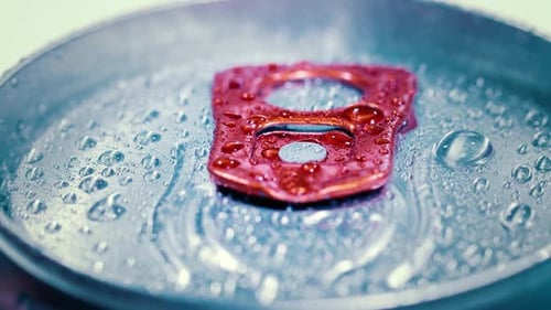 Close-up of Silver Soda Can with Water Droplets