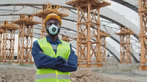 Construction Worker at Construction Site Wearing Facemask