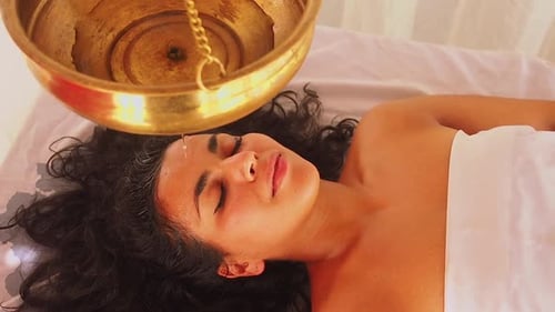 Young Woman Doing Healthcare Indian Traditional Treatment in Ayurveda Body Constitution Centre