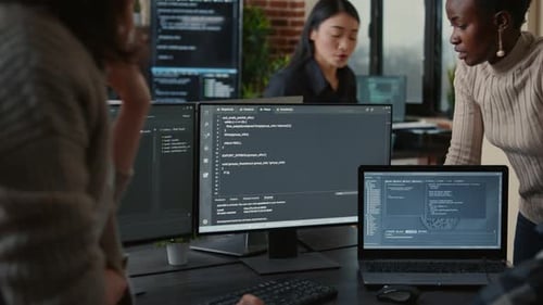 Software Developers Discussing About Source Code Compiling Discovers Errors and Asks the Rest of the