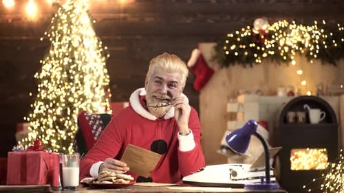 Blonde Bearded Man Reads Christmas Letters