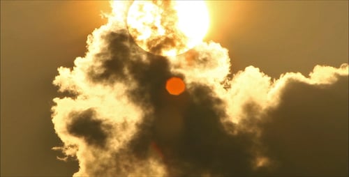 Tropische Sonne hinter Wolke 5