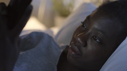 Face of Woman Using Smartphone at Night