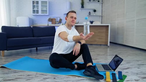 Man Doing Online Workout at Home