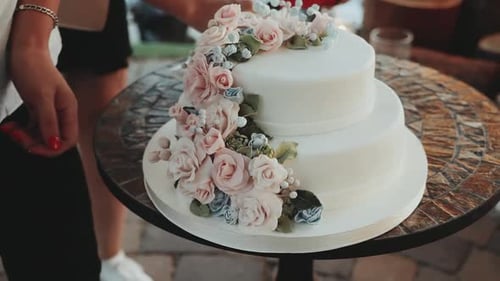 Elegant Two Tier Wedding Cake Decorated with Roses