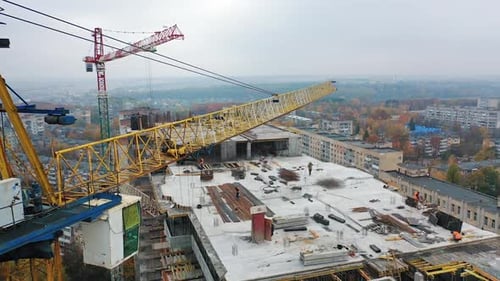 Construction of a residential apartment complex. Multi-storey building under construction.