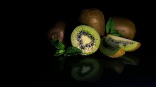 Fresh Kiwi Fruit Still Life with Mint Leaves