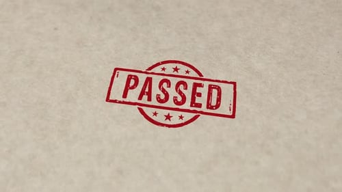 Passed Red Grunge Rubber Stamp Animation on Paper