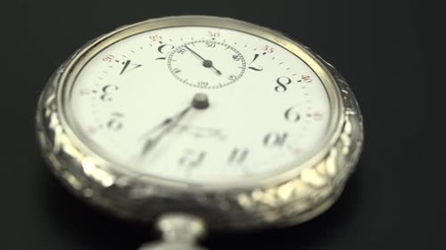 Close Up of Elegant Antique Silver Pocket Watch