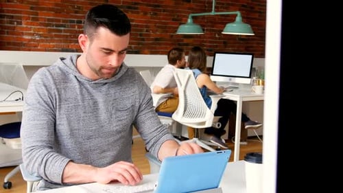Executive using digital tablet 4k