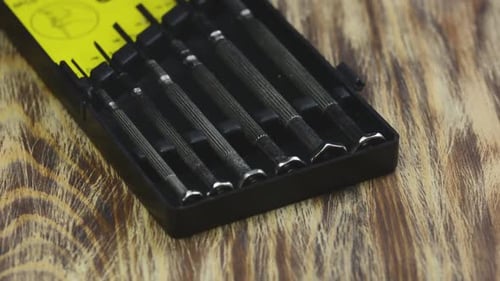 Small Screwdriver Set on Wood Surface