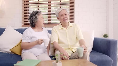 Elderly Couple Enjoying Coffee Together at Home
