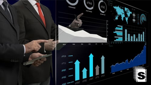 Businessmen Analyzing Financial Data on Futuristic Screen
