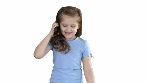Smiling Child Talking on a Phone