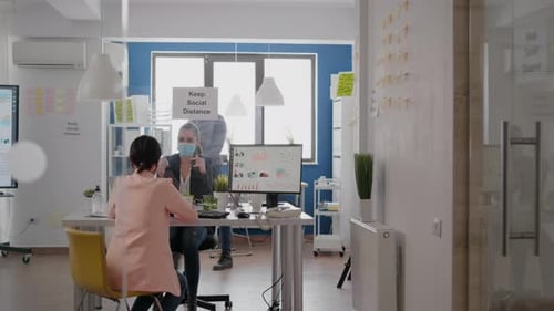Office Workers Meeting with Face Masks