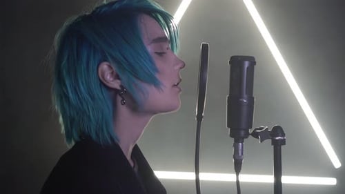 A Man Sings in a Professional Recording Studio