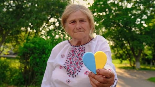Grandmother in Ukrainian Embroidered Clothes