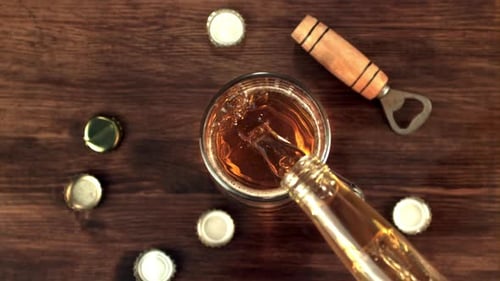 Pouring Beer into Glass overhead shot