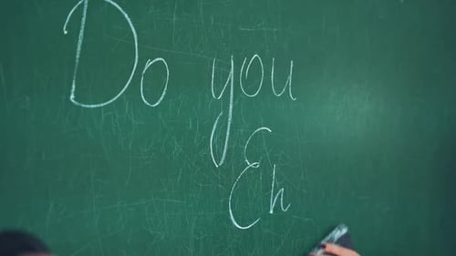 Erasing Chalkboard in Classroom Setting