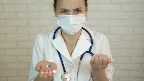 Doctor with Medicine Capsules