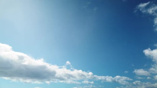 Clouds Moving in a Blue Sky Time-Lapse