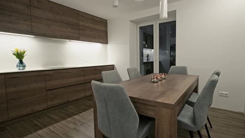 Modern Kitchen Design With Wooden Table and Chairs