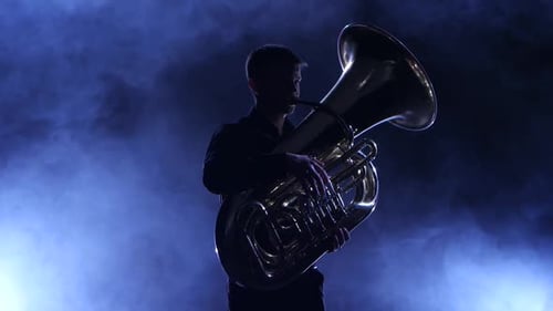 Musician in a Smoky Studio Playing in a Tuba, Silhouette