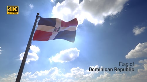 Dominican Republic Flag Waving Against Bright Sun and Blue Sky