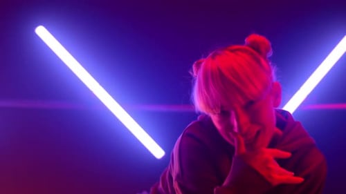 Trendy Girl Dancing Street Style in Nightclub Closeup