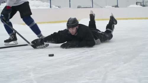 Ice Hockey Players in Action on Winter Rink