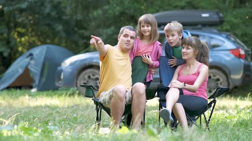 Family Camping Together and Enjoying Time in Nature