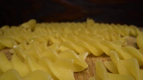 Sliding Over Spiral Pasta on Light Table. Macro Dolly Shot. Laowa Lens.