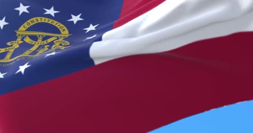 Waving Flag of Georgia State in Blue Sky