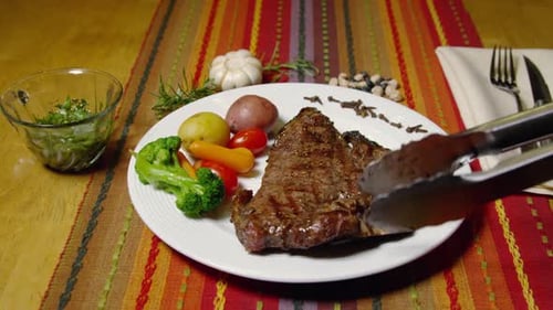Juicy Steak Placed on Plate with Vegetables