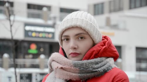 Sad Girl Student Portrait in Warm Clothes in Spring Autumn or Winter