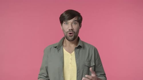 Man Expressing Shock with a Surprised Facial Expression